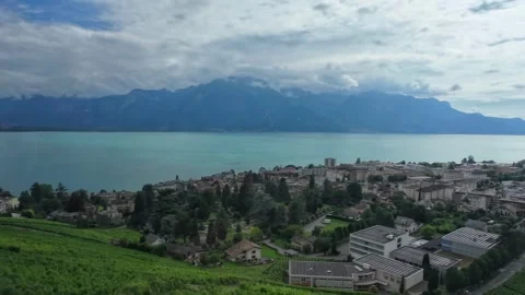Train Window View of Lake Geneva and Coastal Town Stock Footage 340367939