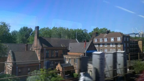 Train window view slowly in london Stock Footage 92829016