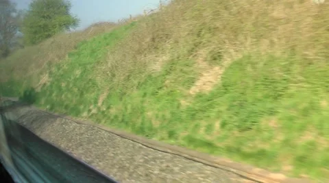 Train from window view speeding landscape Stock Footage 49472126
