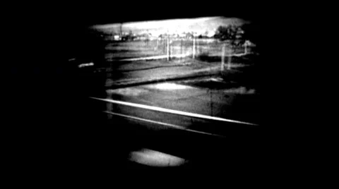 Train Window View Urban and Rural Landscape - Vintage Super8 Film Stock Footage 10562790