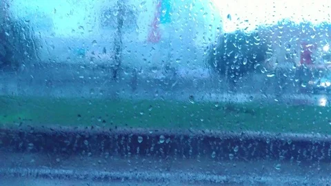 Train window with water drops. Blurred landscape at daytime. Stock Footage 86681996