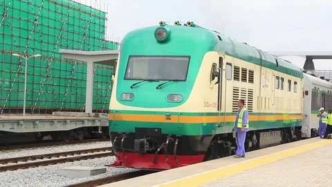 Train workman talks to hands document to driver Stock Footage 75892945
