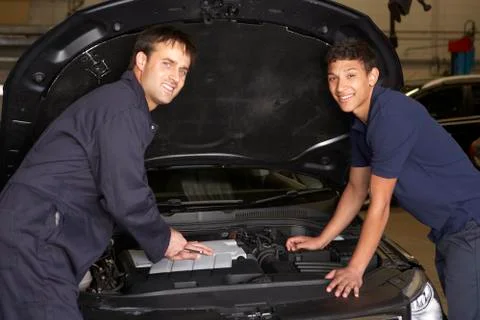 Trainee mechanic at work Stock Photos