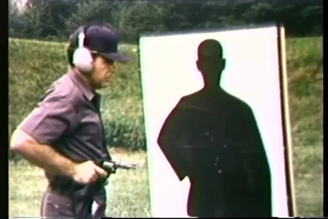 Trainee practice target drill with pistol - 1965 Stock Footage 106067564