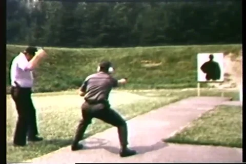 Trainee practice target drill with pistol - 1965 Stock Footage 106067575