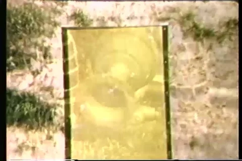 Trainee practice target drill with pistol in open field - 1965 Stock Footage 106067630