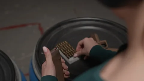 Trainee Reloading Handgun during Practice in Shooting Range Video stock 311046358