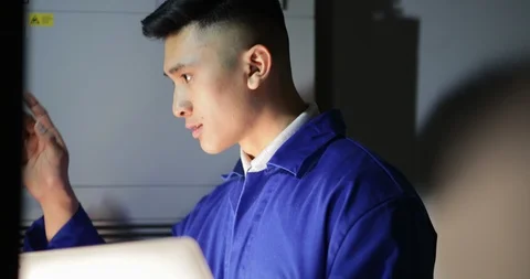 Trainee Technician in the Server Room Stock Footage 109524833
