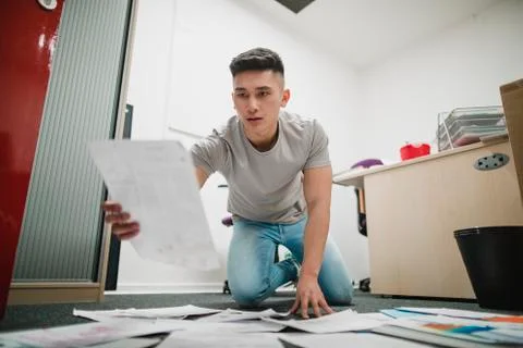 Trainee Working in a Creative Office Photos