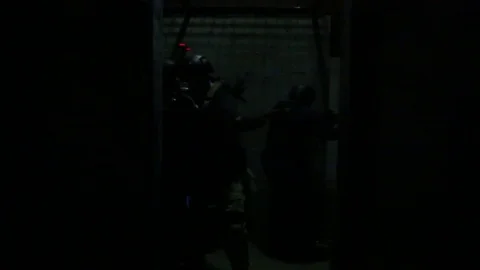 Trainees Use Weapon Lights To Illuminate Corrider Stock Footage 70562156