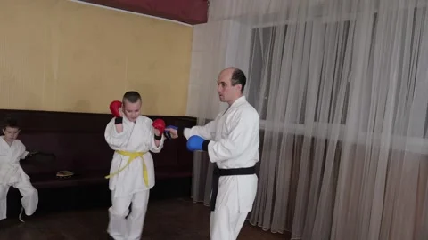 A trainer and student are training tactics of sports combat Video stock 317691212