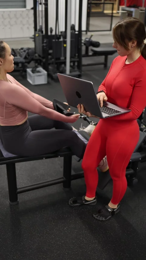 Trainer creates a personalized workout plan Stock Footage 337956964