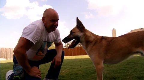 Trainer with Dog Stock Footage 39829317