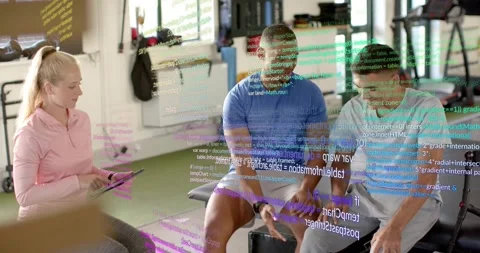 Trainer gesturing toward client's knee, starting fitness test for assessment Stock Footage 316563606