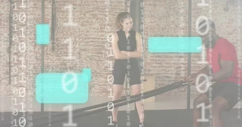 Trainer giving nod, athlete performing battle rope waves with sliding data Stock Footage 318142652