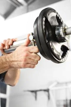 Trainer in the gym, training with weights Stock Photos