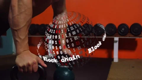Trainer leaning over kettlebell, adjusting for fitness while blockchain sphere Stock Footage 328346061