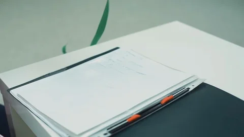 Trainer Making Notes of Measuring her Client Stock Footage 111860187