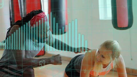 Trainer reaching lower back, adjusting plank for alignment while client holding, Stock Footage 333817695