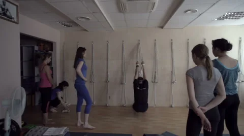 The trainer shows how to stretch Stock Footage 64809446