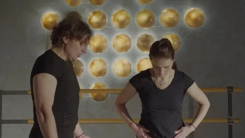 Trainer shows student physical exercises frontal plan Stock Footage 123313602