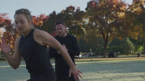 Trainer Watching His Clients Form Runnin... | Stock Video | Pond5