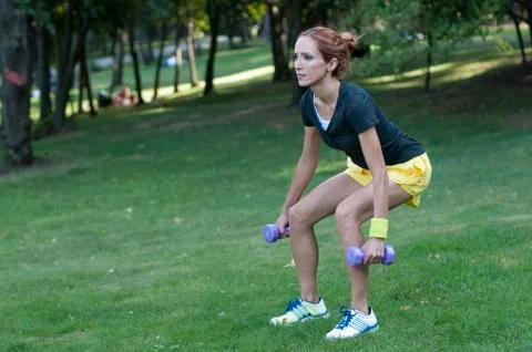 Trainer workout with dumbbell Stock-Fotos