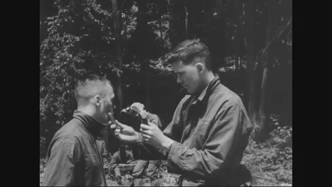 Trainers teaching cadets various techniques involving field patrol - 1950 Stock Footage 90460195