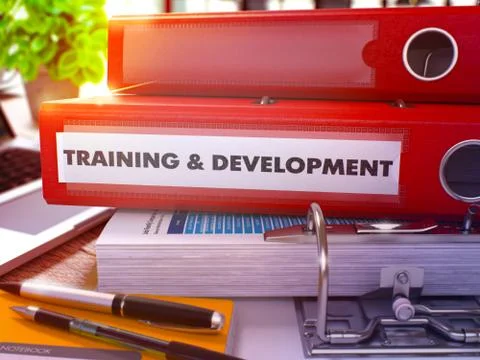 Training and Development on Red Ring Binder. Blurred, Toned Image Stock Illustration