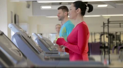 Training and drinking water on the treadmill Stock Footage 47894263