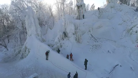 Training and ice climbing competition on ice pillars. Russia. Winter aerial view 스톡 동영상 86514791
