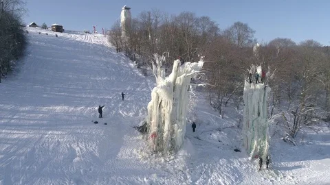 Training and ice climbing competition on ice pillars. Russia. Winter aerial view 스톡 동영상 86514912