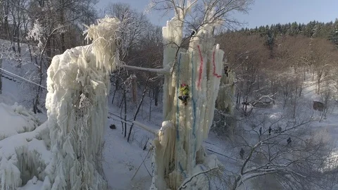 Training and ice climbing competition on ice pillars. Russia. Winter aerial view 스톡 동영상 86515024