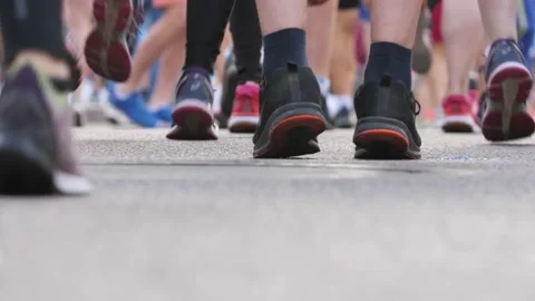 Training on asphalt. Athletes steps on the spot. Stock-Footage 138759902