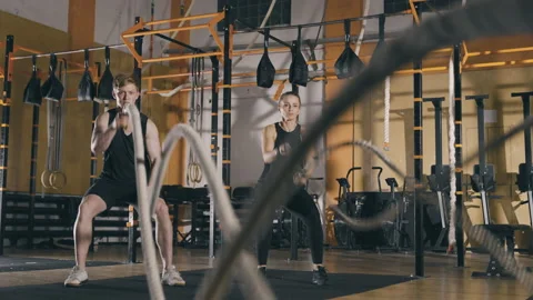 Training with battle ropes Stock Footage 153058253