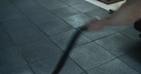 Training with battle ropes, intense strength exercise in closed gym. Men doing Stock Footage 130219072