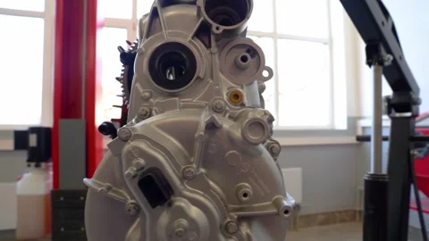 Training to become an auto mechanic at a technical college. Stock Footage 332920847