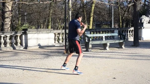Training In Boxing In The Royal Park of Brussels Stock Footage 70694347