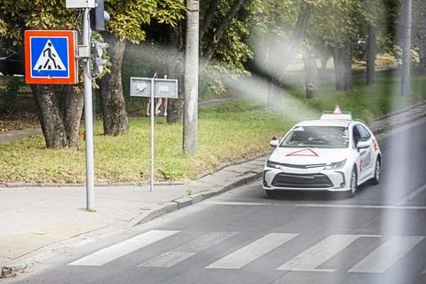 Training car at a pedestrian intersection. Driving School 写真素材