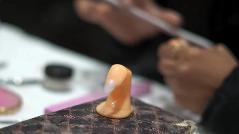 Training Class for Shaping Artificial Nails in Professional Nail Art Course Stock Footage 325528996