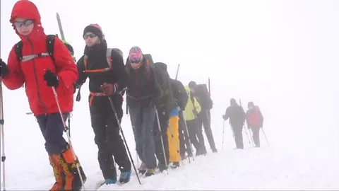 Training in difficult mountain conditions. Motivation. Stock Footage 69099313