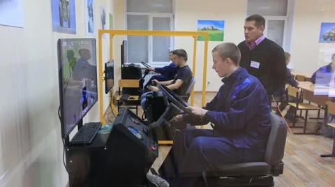 Training on driving techniques on simulators, tractors and excavators Stock Footage 68110124