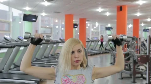 Training with dumbbells Stock Footage 57648661