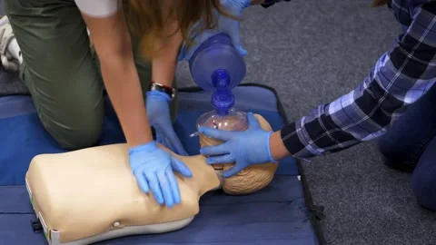 Training for emergency aid course. First aid cpr resuscitation training Stock Footage 143590195