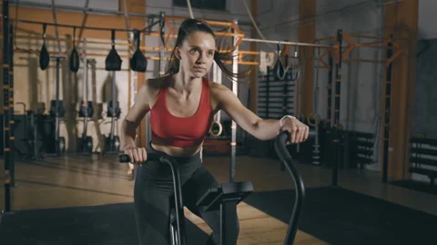 Training on exercise bike Stock Footage 153237134