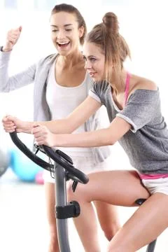 Training on exercise bike  Stock Photos