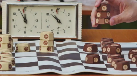 Training game in Russian chess at the table in the Park Stock Footage 66512472