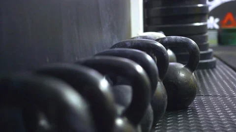 Training with kettlebells in gym Stock Footage 71944091