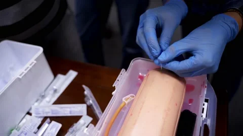 Training operation on a mannequin, closeup video. Medical training. Stock Footage 144010086
