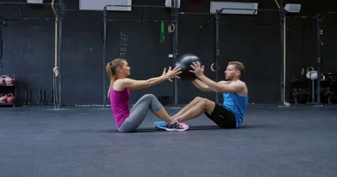 Training Pair Working Out With The Medicine Ball Stock Footage 75038676